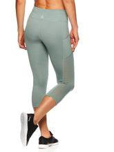 Load image into Gallery viewer, Reebok Women's Focus Capri Leggings
